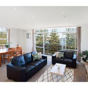 View Of Manly Pines And Waves From Large Apartment