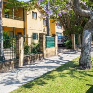 Suburban Two-bed Apartment with Parking and Patio