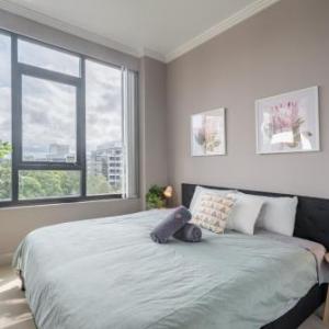 Olympic Park near Qudos Bank Arena King Bed 1BR 1Bath Sleeps 6 Air-cond parking